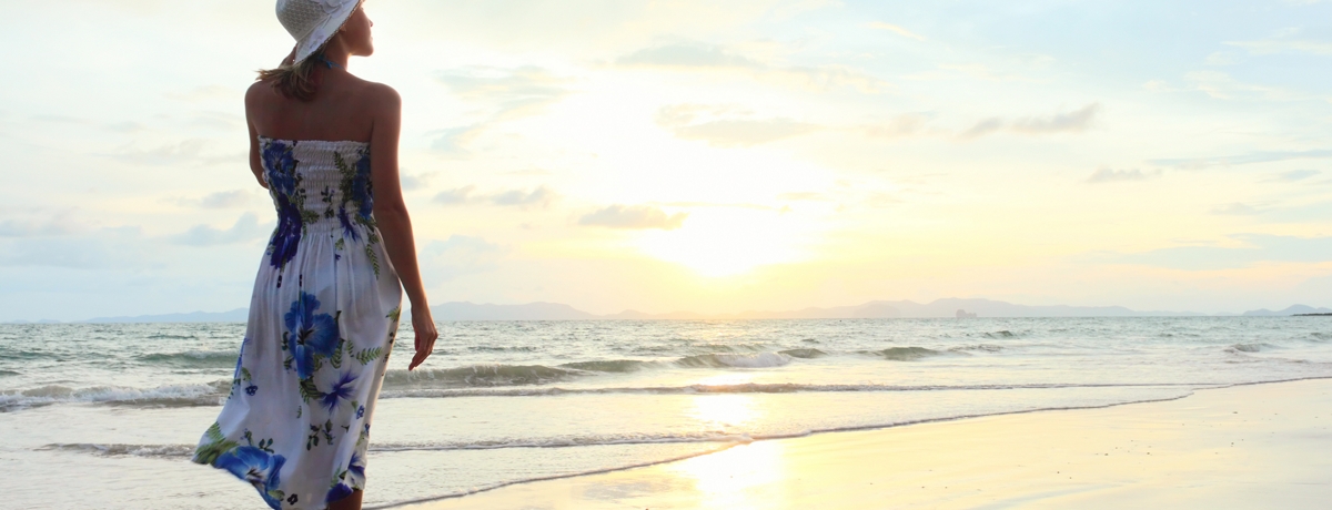 DOW Hero Image - Lady on Beach with Sunset